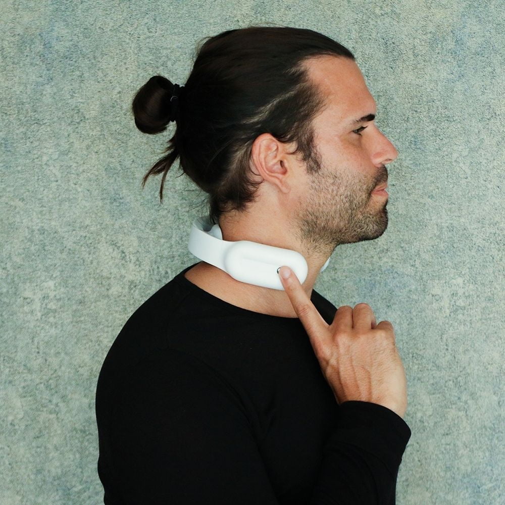 a man using a must have portable neck massagers